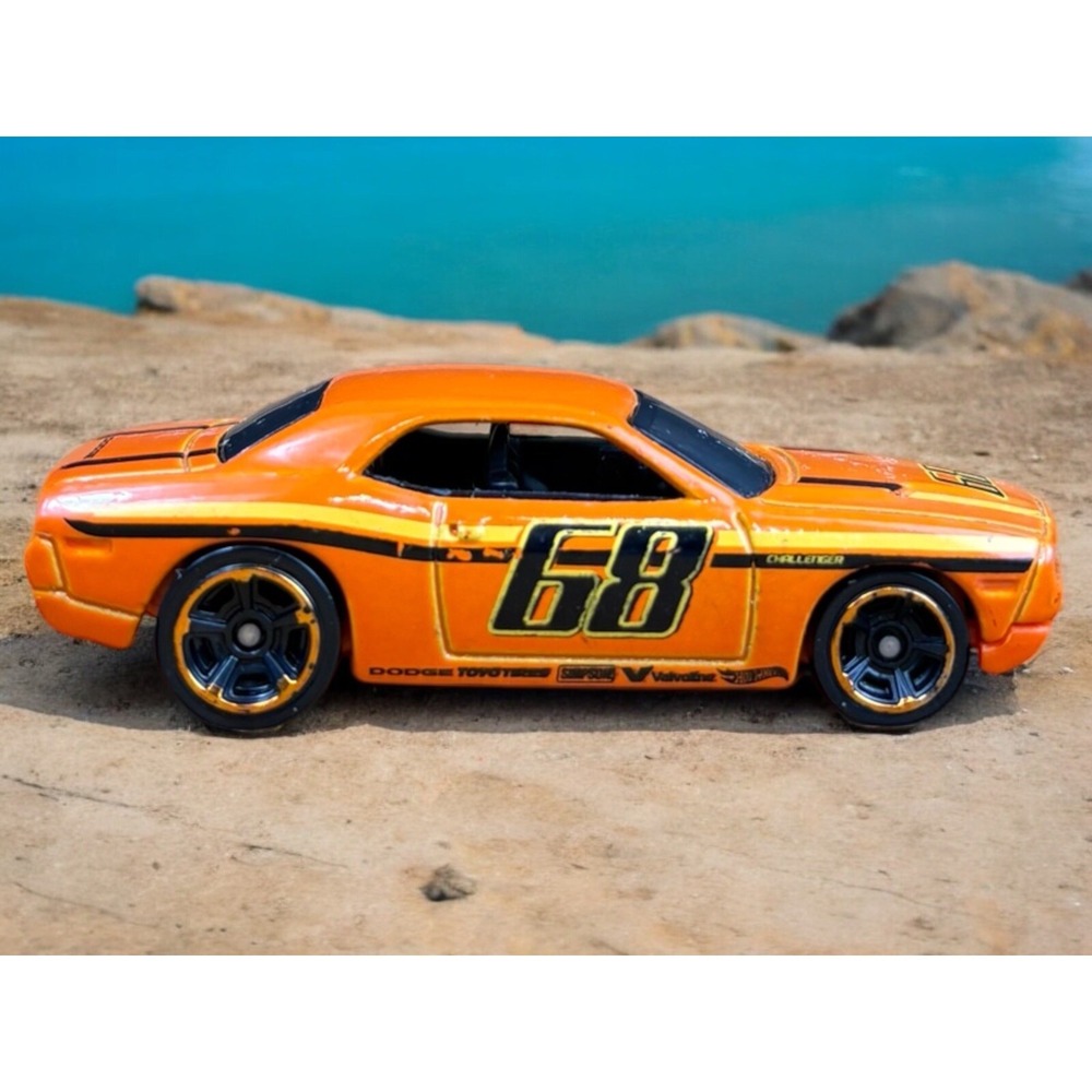 2014 Hot Wheels'12 Dodge Challenger Concept #68 Orange Diecast Race Car